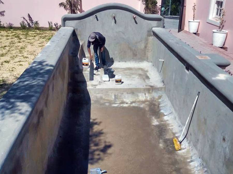 creative cascades work portfolio grey rectangle swimming pool fibreglass relining before