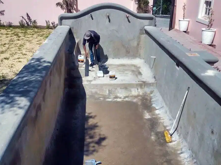 creative cascades work portfolio grey rectangle swimming pool fibreglass relining before